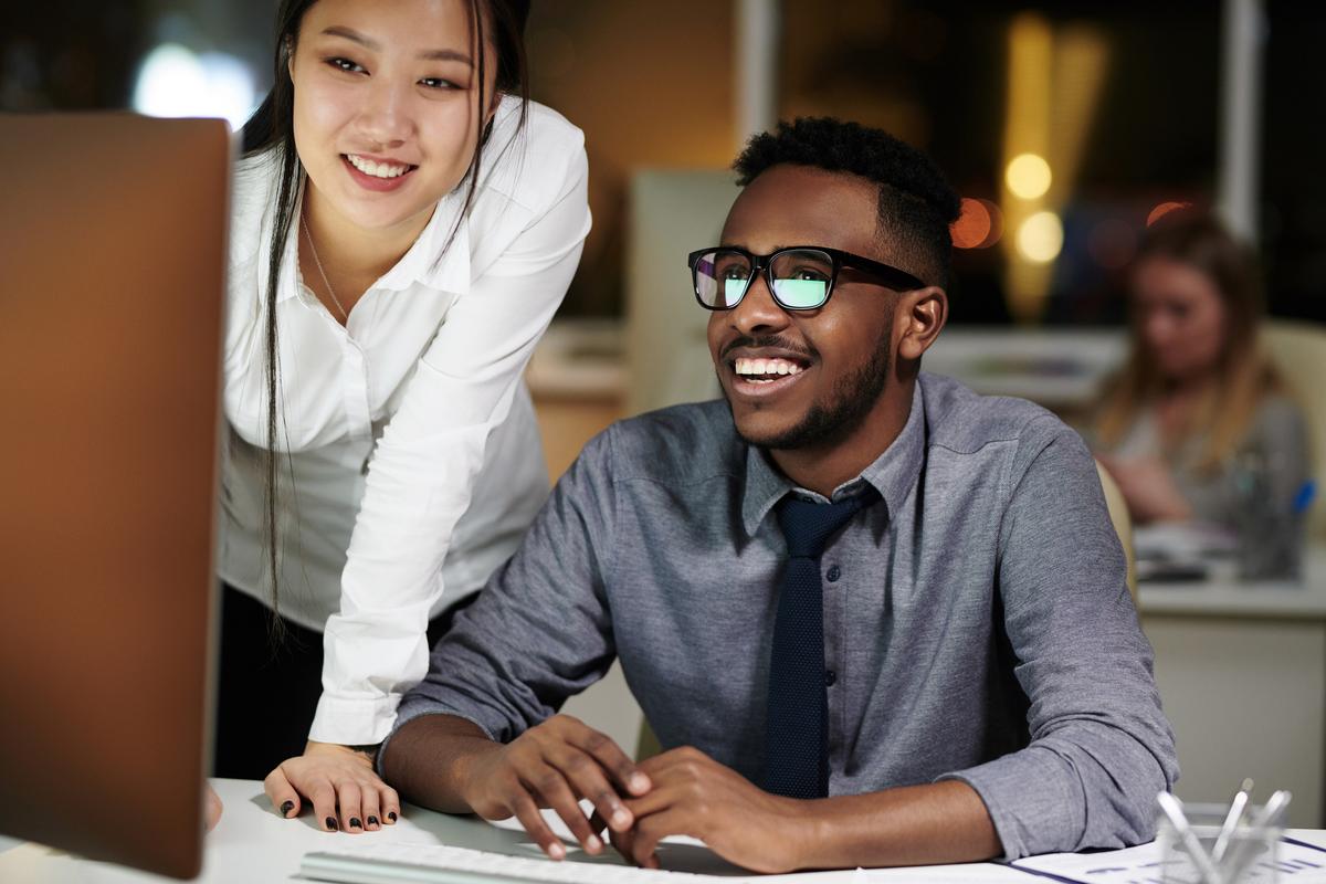 Two colleagues working in an office